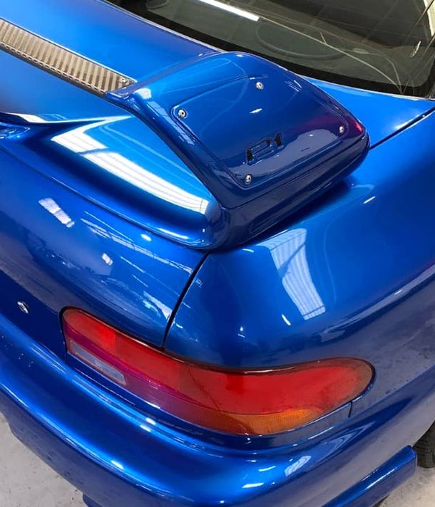 Blue muscle car paint restoration